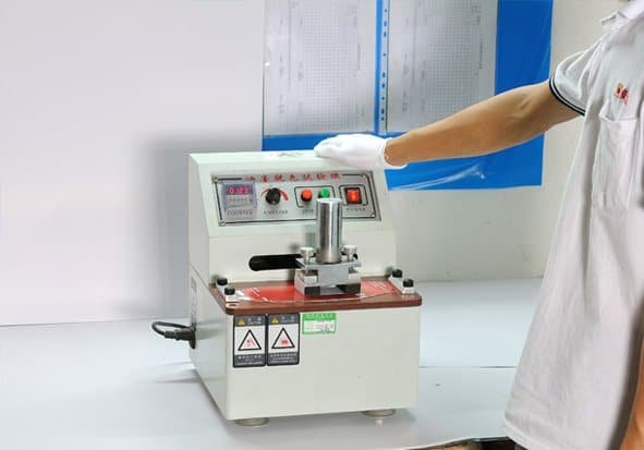 Ink Rub Resistance Tester evaluating ink durability and abrasion resistance on printed surfaces