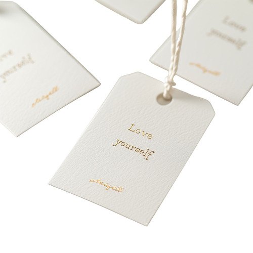Hang tags – high-quality tags for clothing and retail products with clear branding and pricing.