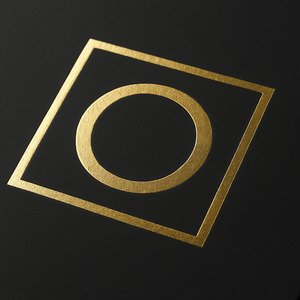 Hot foil stamping – metallic gold or silver decoration enhancing luxury packaging design.